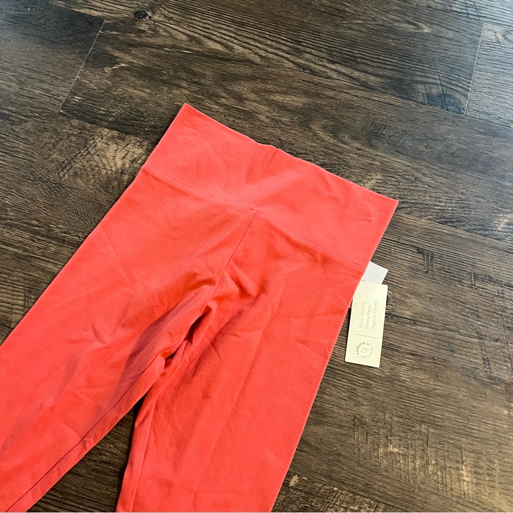 Forever 21 Bold coral orange leggings size small NWT